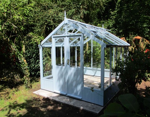 <strong>RAVEN:</strong> An 8ft 9in wide (2660mm) model with toughened safety glass. Locking hinged door. Various lengths available from 6'4 (1920mm) to 20’10 (6360mm). Various finishes & options. Pictured is an 8ft 9in x 8ft 4in Raven in Roben's egg blue colour.