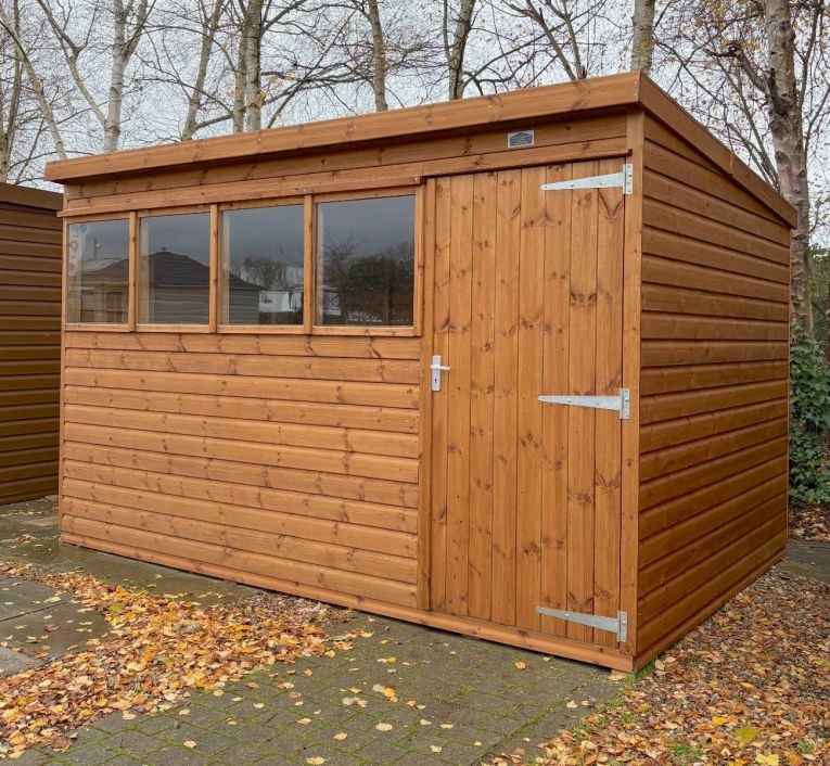 Craftsman Pent 12ft x 8ft in light brown wood protective treatment