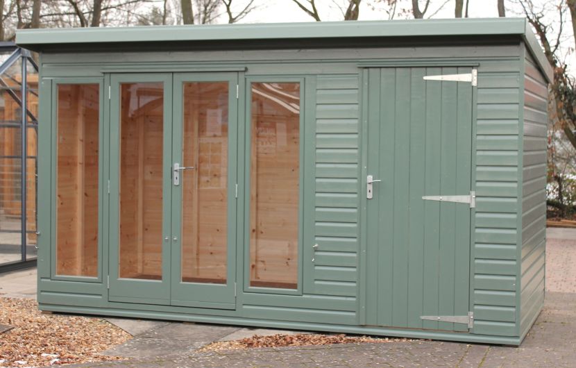 With integral shed, green woodstain finish