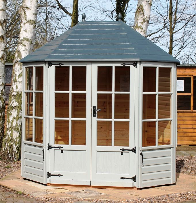 8ft x 6ft (2.4m x 1.8m). Standard Georgian design & grey woodstain finish